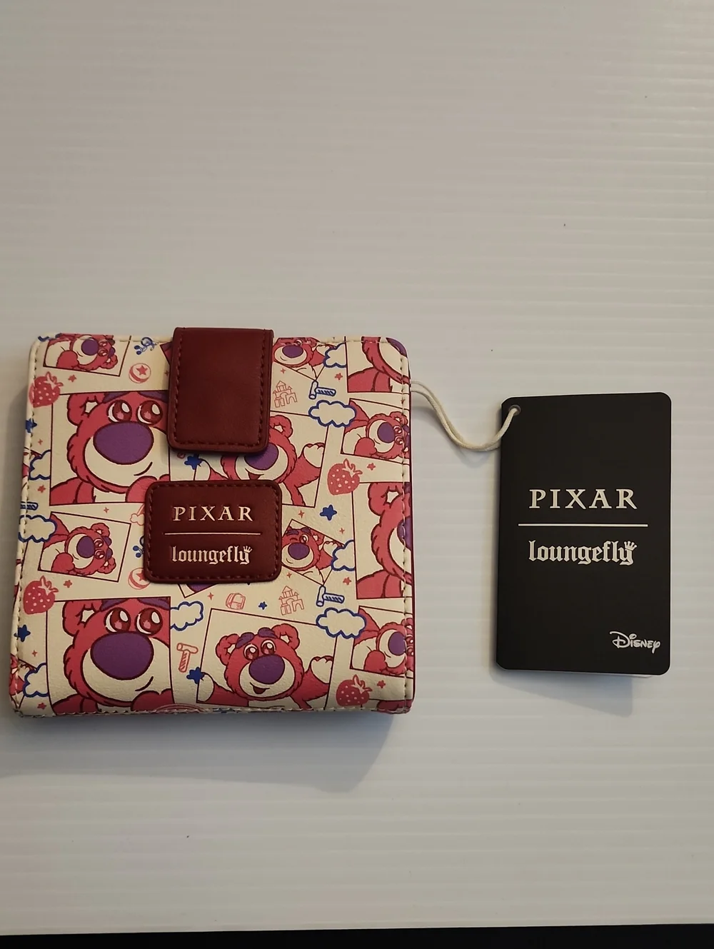 Loungefly Pixar Lotso All-Over-Print Snap Wallet. NWT. 5×5